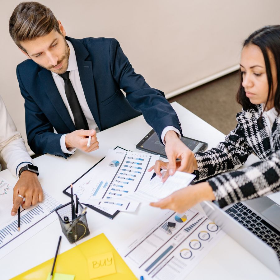 Business team reviewing strategy and analytics in an office